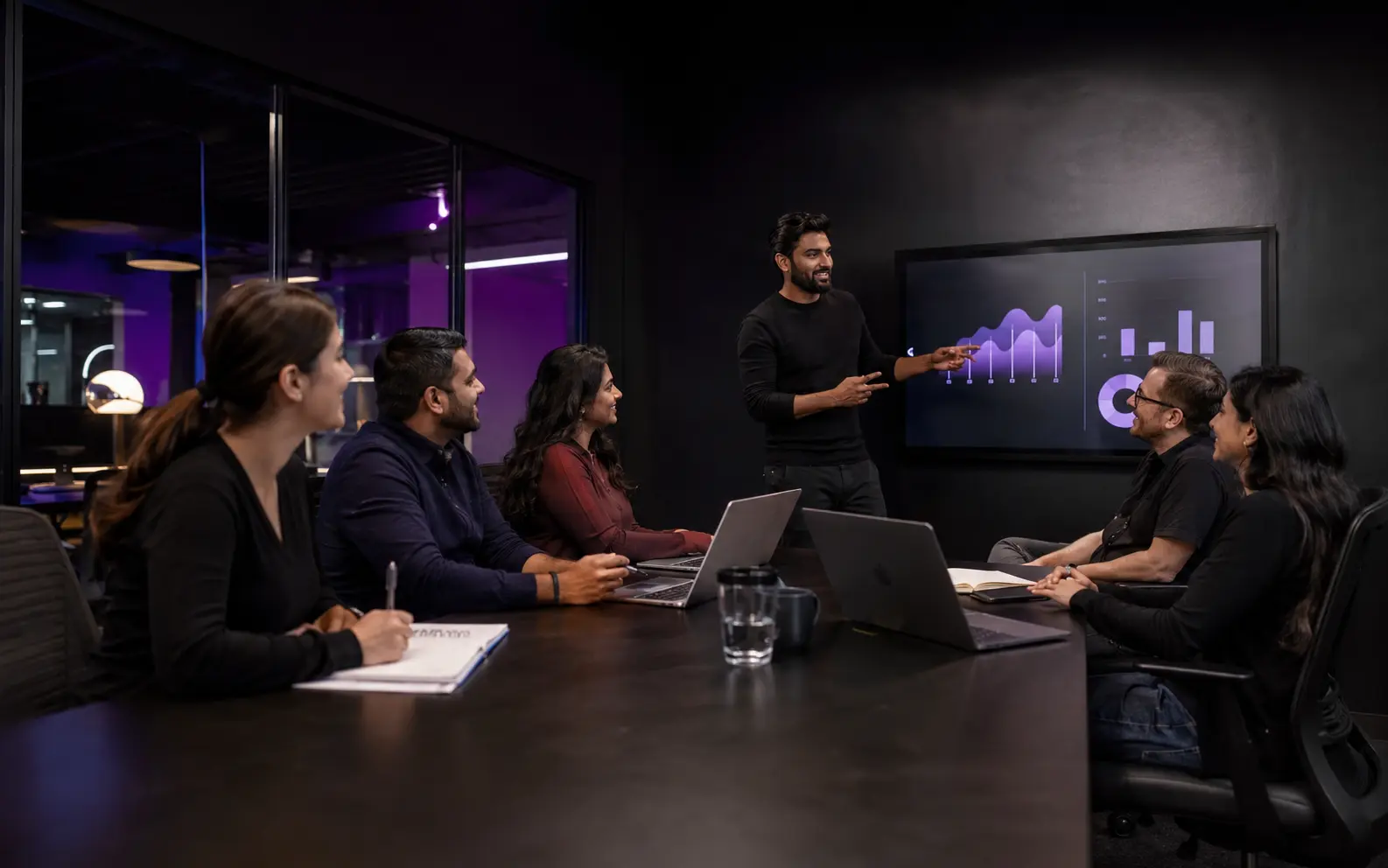 Timex Solution team collaborating in a modern office